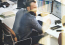 man sat at a desk